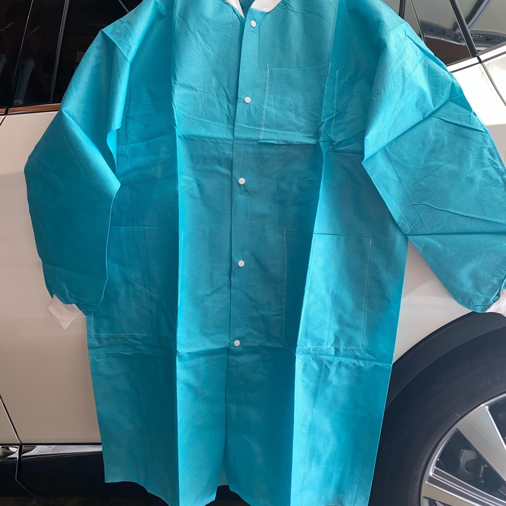 Disposable water resistant Teal lab coats (10 in pack) size Large. Teal X-Large